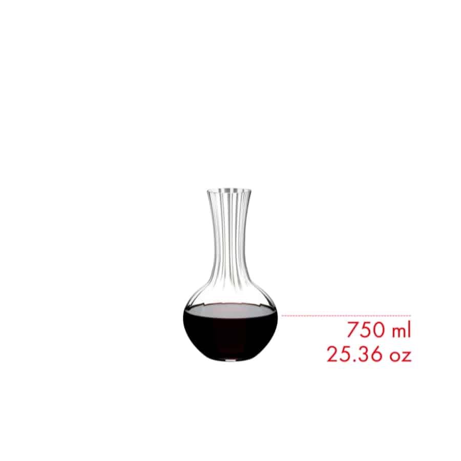 Riedel Decanter Performance made of clear glass with a wide base and elegant spout for aerating and serving wine.