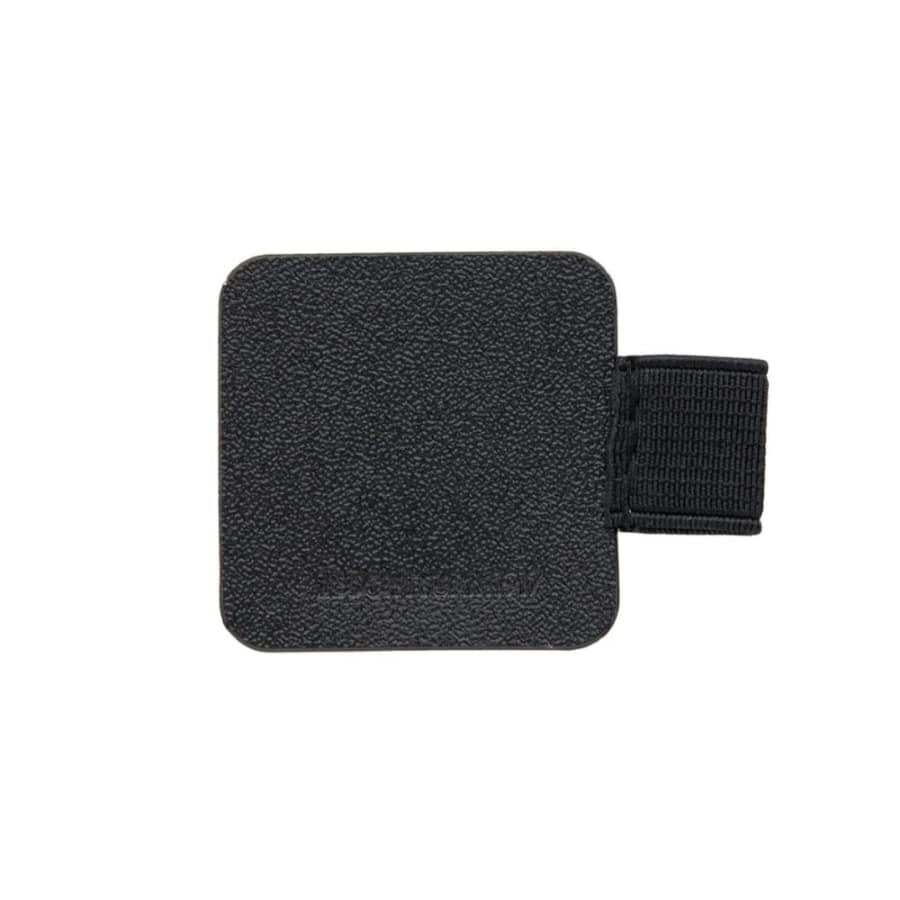 Leuchtturm1917 pen loop attached to a notebook, black elastic band holding a pen securely on a stationery journal.