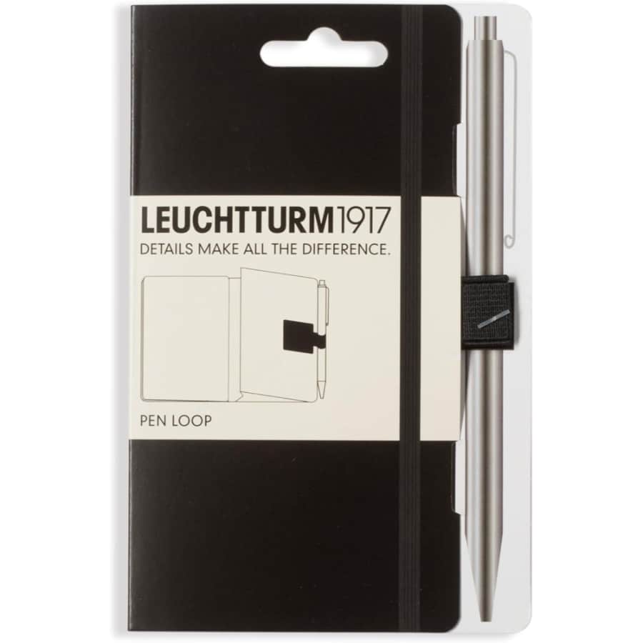 Leuchtturm1917 Pen Loop attachment for notebook covers, holding a black pen securely on the leather cover.