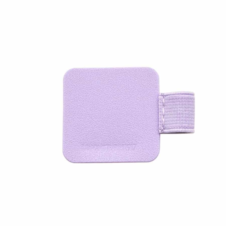 Leuchtturm1917 Pen Loop attached to a notebook, holding a black pen for easy access and organization.