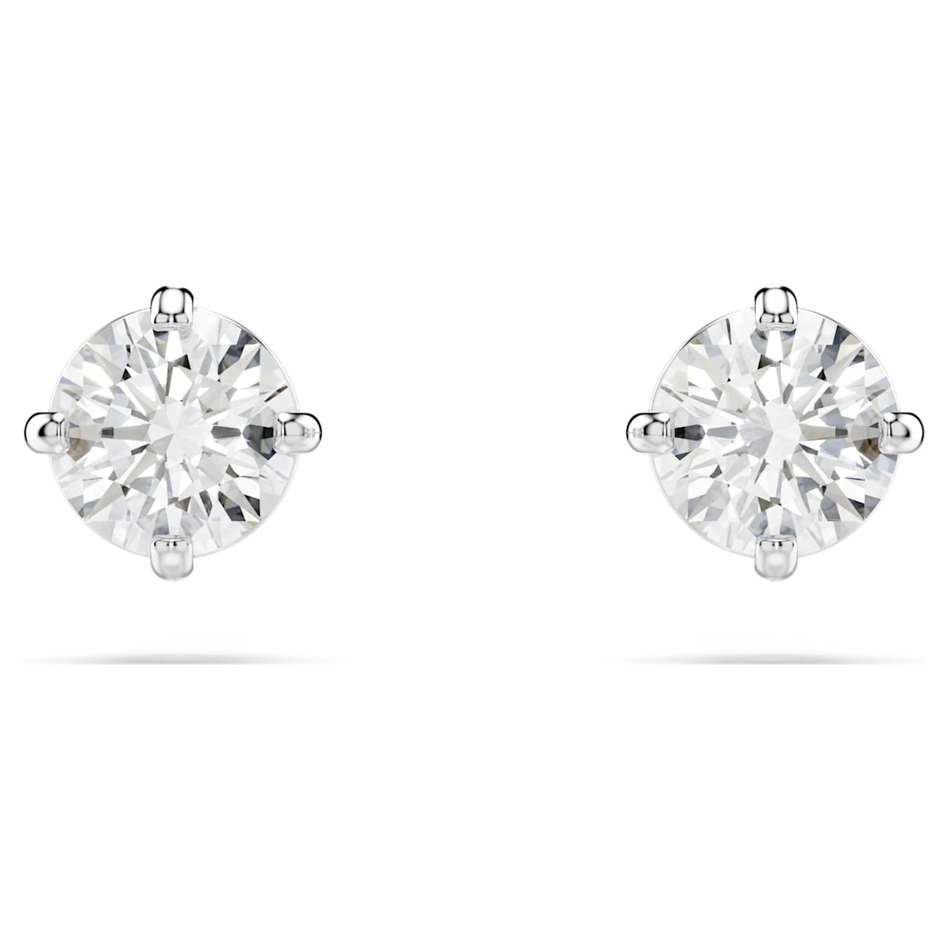 Swarovski Stilla Attract stud earrings with round cut white crystals and rhodium plating, elegant jewelry accessory.