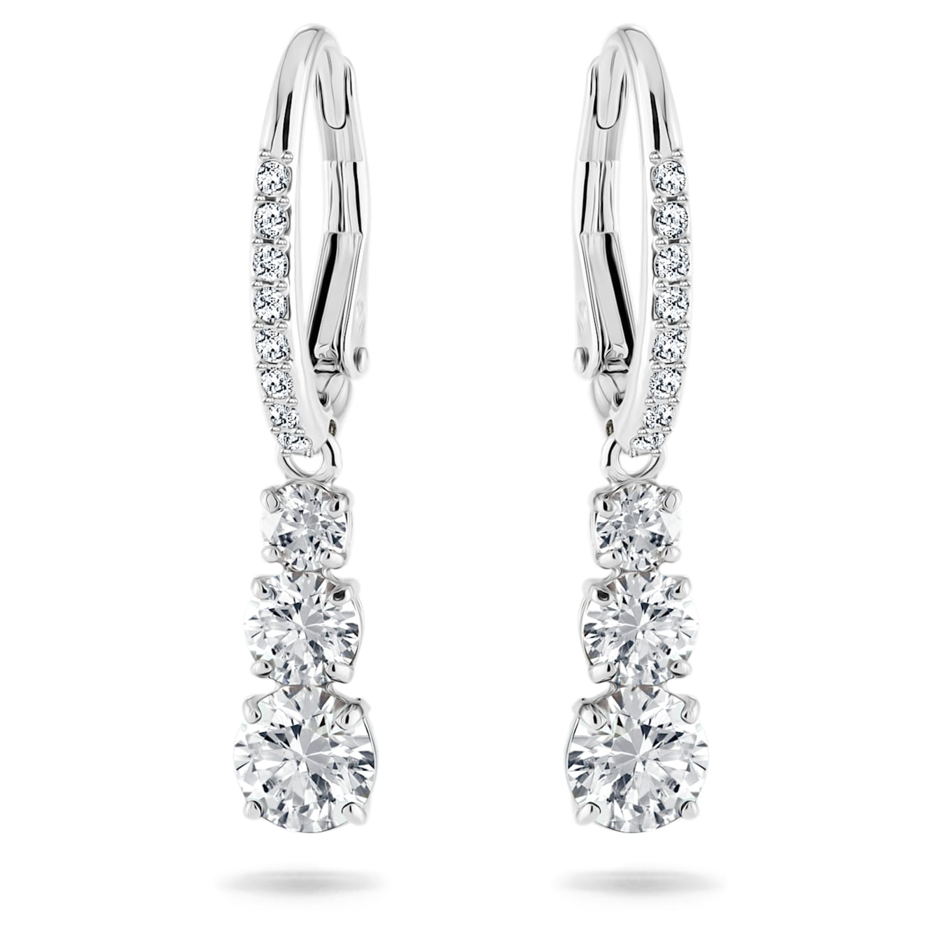 Swarovski Stilla Attract hoop earrings with round white crystals and rhodium plating, showcasing elegant jewelry design.