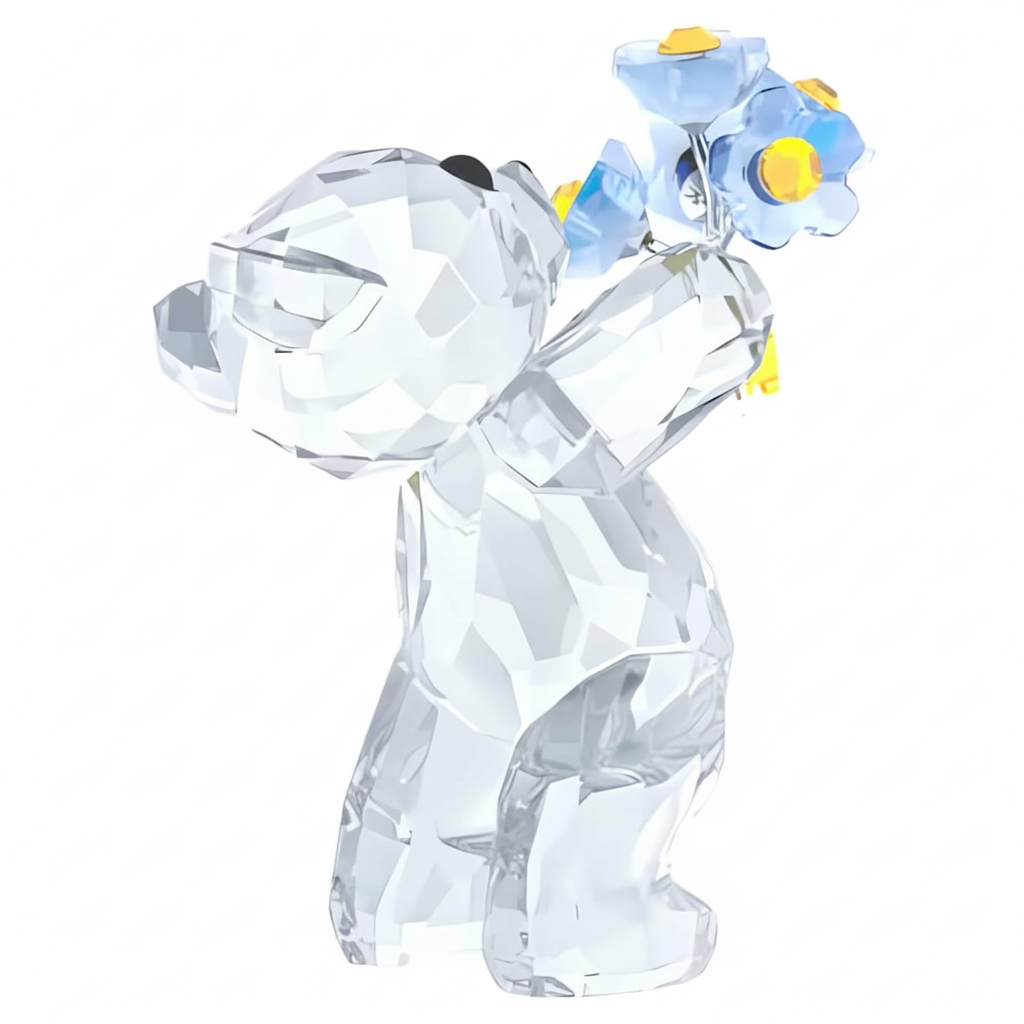 Swarovski Kris Bear Forget-Me-Not figurine with crystal details and floral accents, showcasing the collectible Swarovski bear.