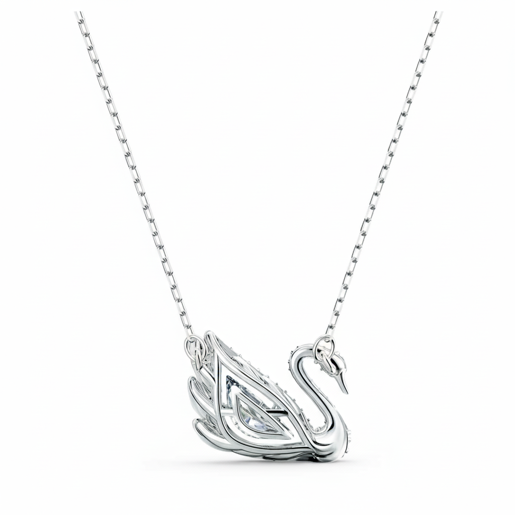 Swarovski Swan necklace with a white dancing swan pendant, rhodium-plated, on a delicate chain, showcasing elegant jewelry design.
