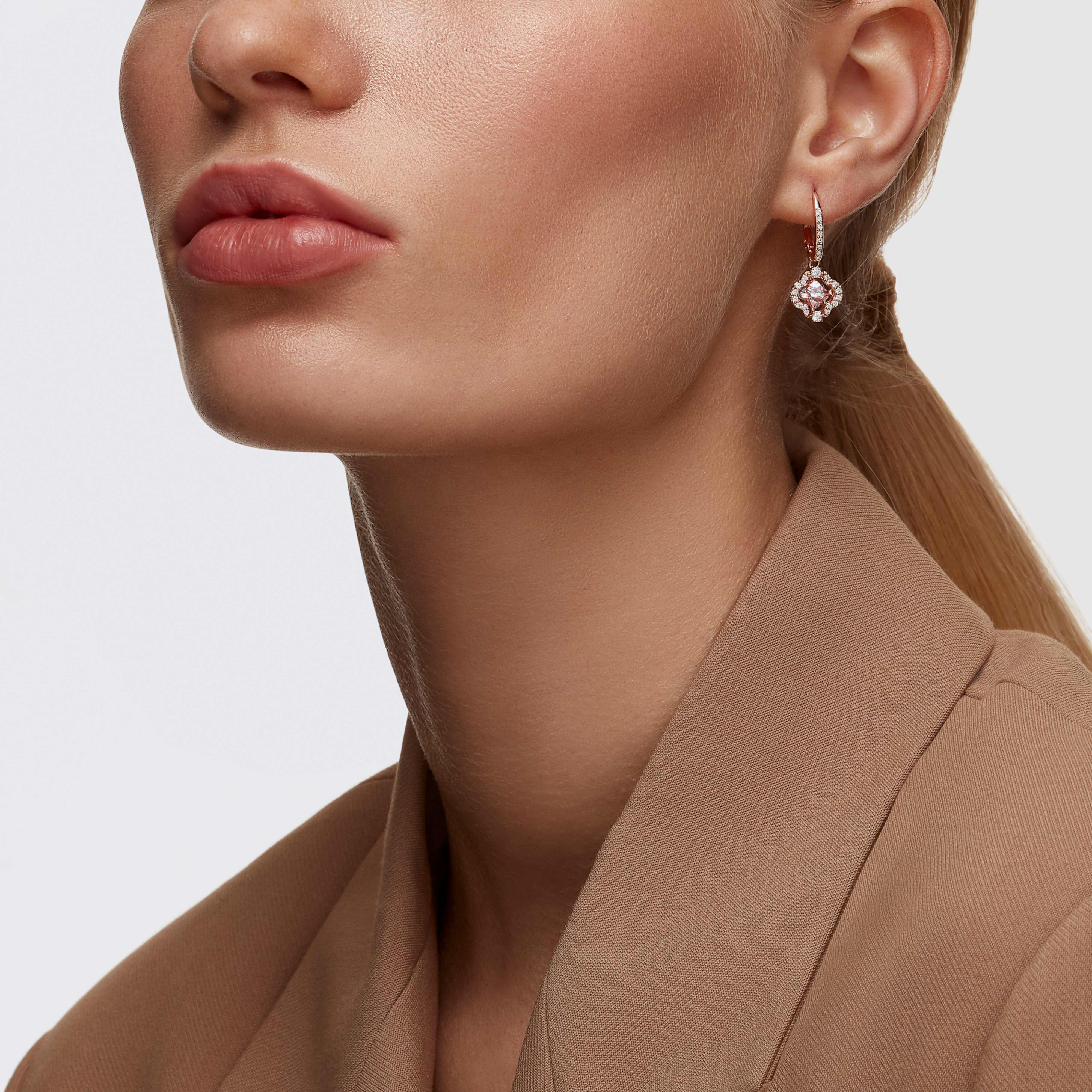 Swarovski Una drop earrings in pink with rose gold-tone plating featuring clover-shaped design and sparkling crystal accents.