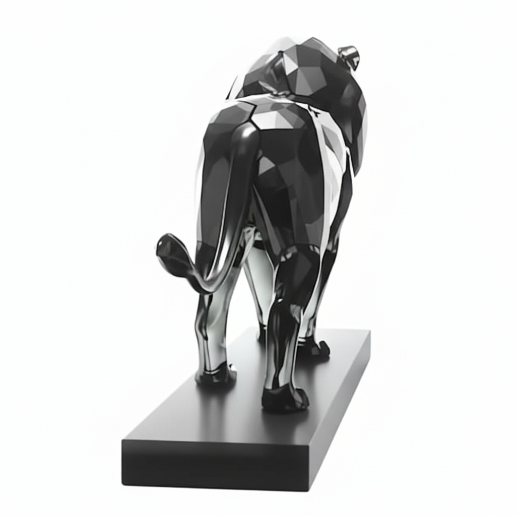 Swarovski The Lion crystal figurine with detailed faceted glass design and gold-tone accents.