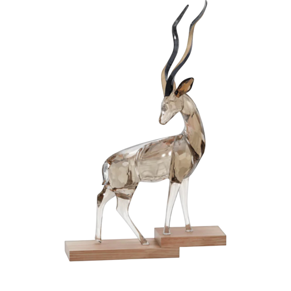 Swarovski African Sunset Kudu Anya crystal figurine with detailed craftsmanship and vibrant sunset-inspired colors.