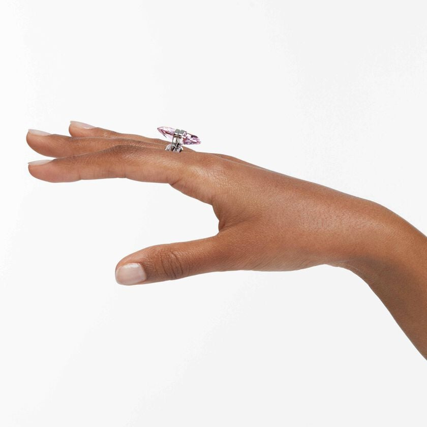 Swarovski Lucent Magnetic Ring in pink with rhodium plating, featuring a sleek, modern design and a magnetic closure.