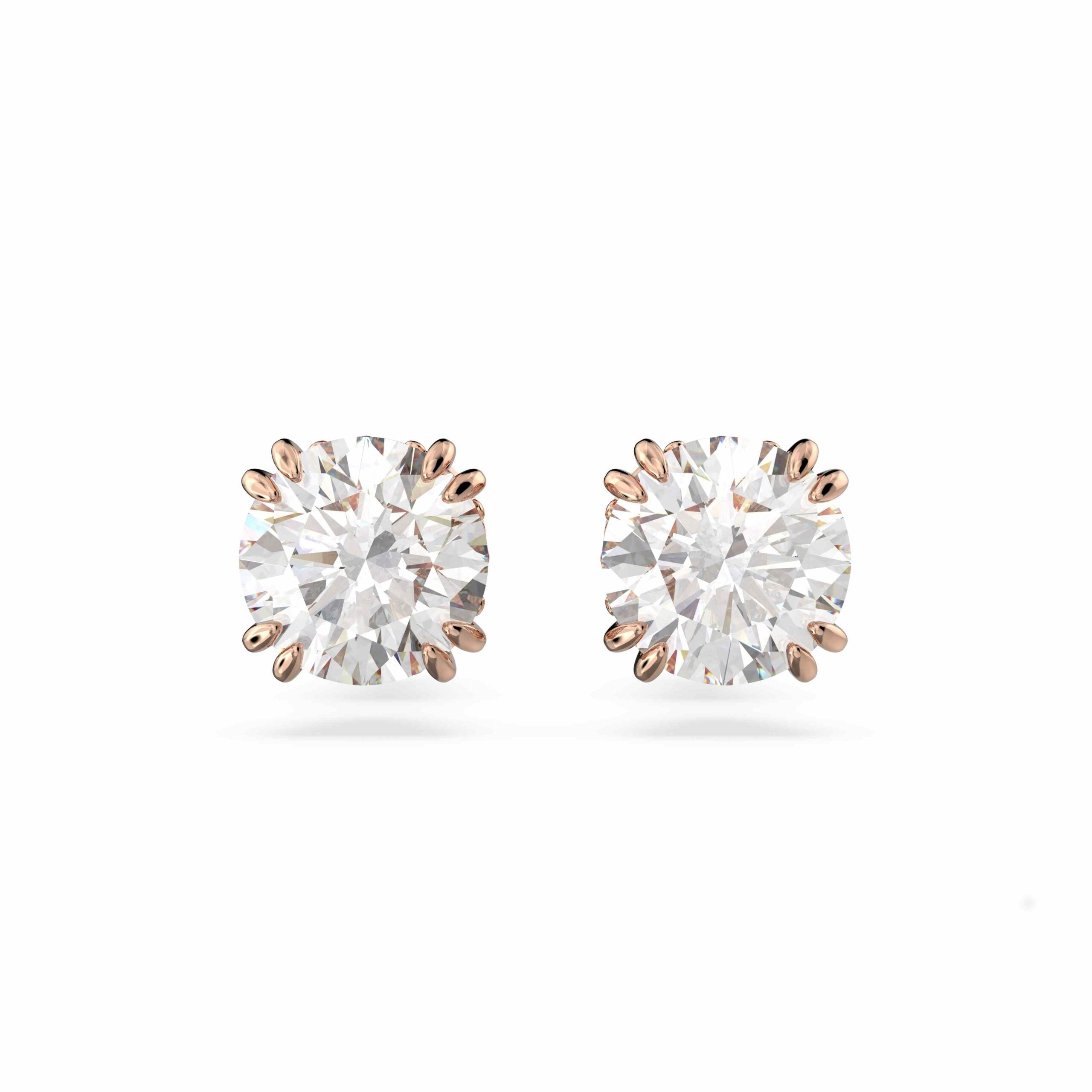 Swarovski Constella stud earrings with round cut crystals, silver-tone metal, and a classic, elegant design.
