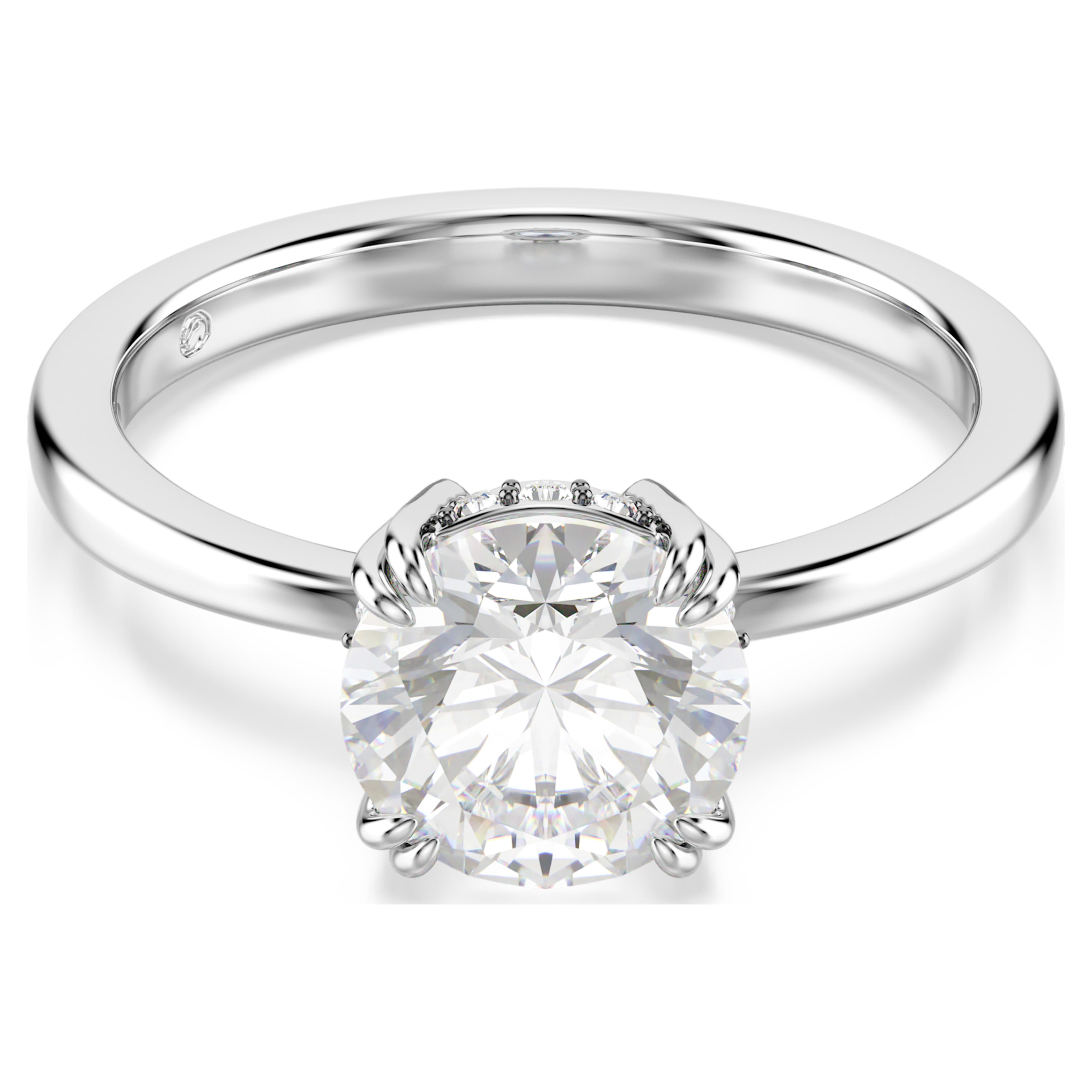 Swarovski Stilla cocktail ring with round-cut white crystal, rhodium-plated band, elegant jewelry accessory.