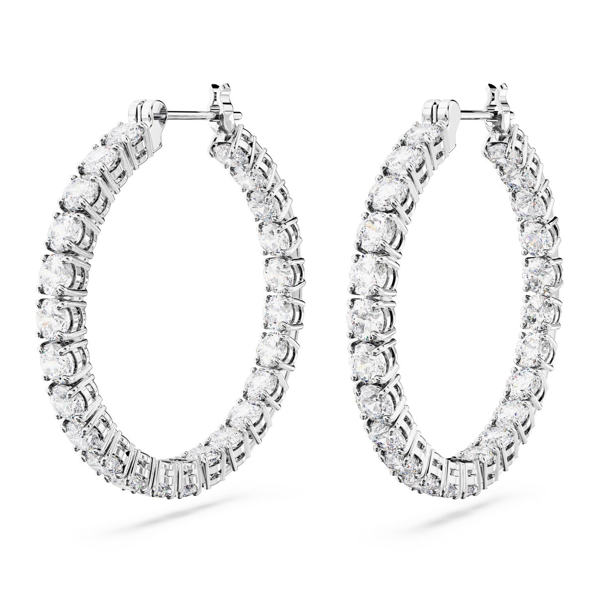 Swarovski Matrix hoop earrings with round cut white crystals and rhodium plating, showcasing elegant jewelry design.