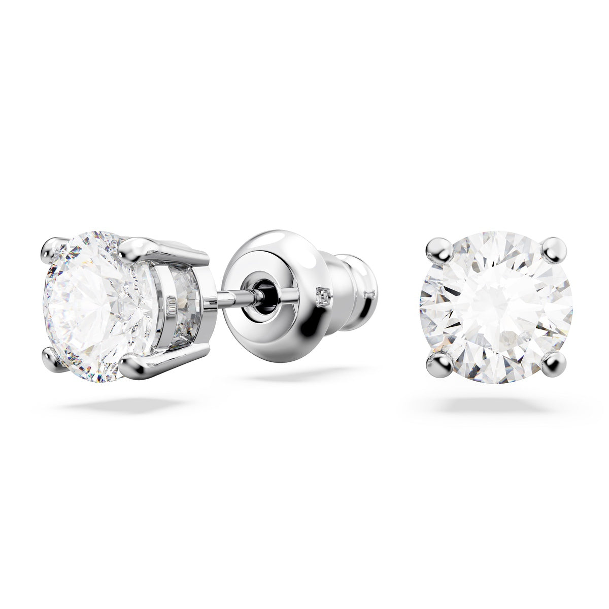 Swarovski Matrix Tennis Set with round-cut white crystals, rhodium-plated design, featuring elegant, sparkling jewelry pieces.