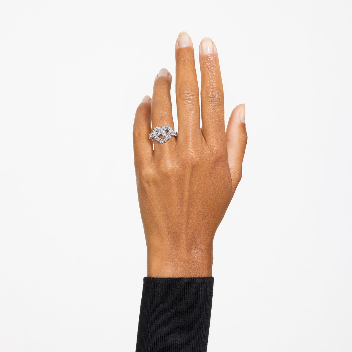 Swarovski Matrix ring with mixed heart and white crystals, rhodium-plated band, showcasing intricate gemstone cuts and elegant design.