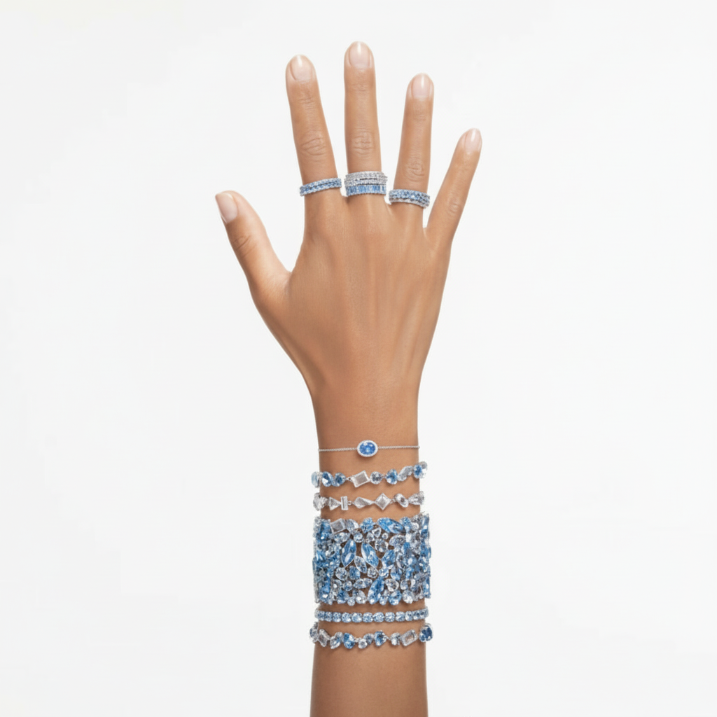 Swarovski Matrix tennis bracelet with round cut crystals, elegant jewelry piece showcasing sparkling gemstones on a sleek silver band.