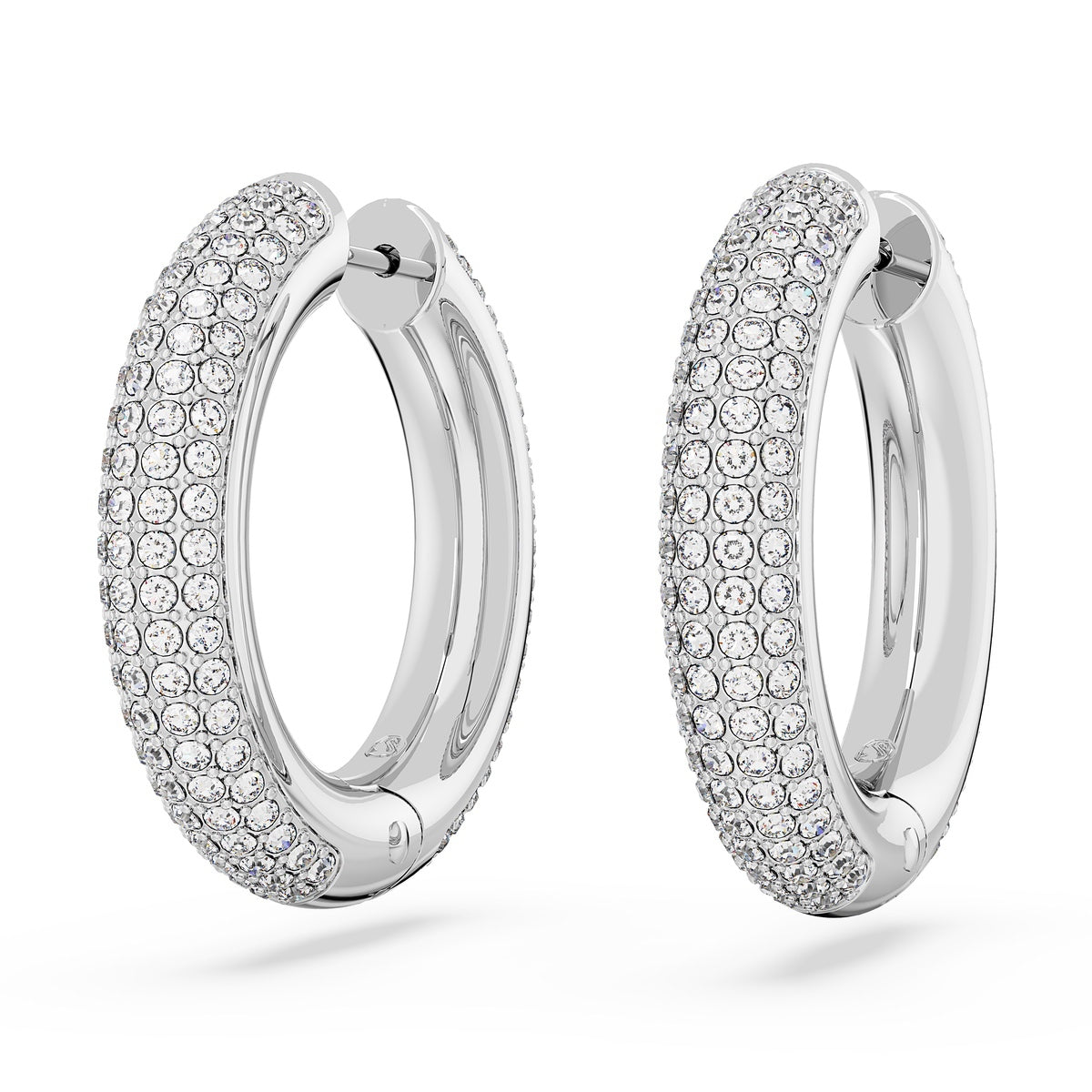 Swarovski Dextera medium hoop earrings in white with rhodium plating, showcasing sleek, polished jewelry design.