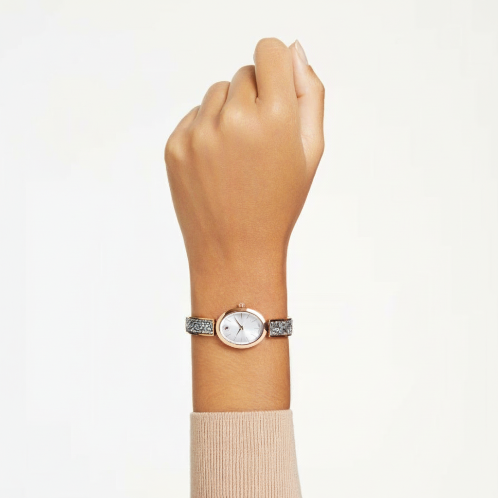 Swarovski Crystal Rock Oval Watch with silver-tone metal bracelet and rose gold-tone finish, featuring sparkling crystal accents.