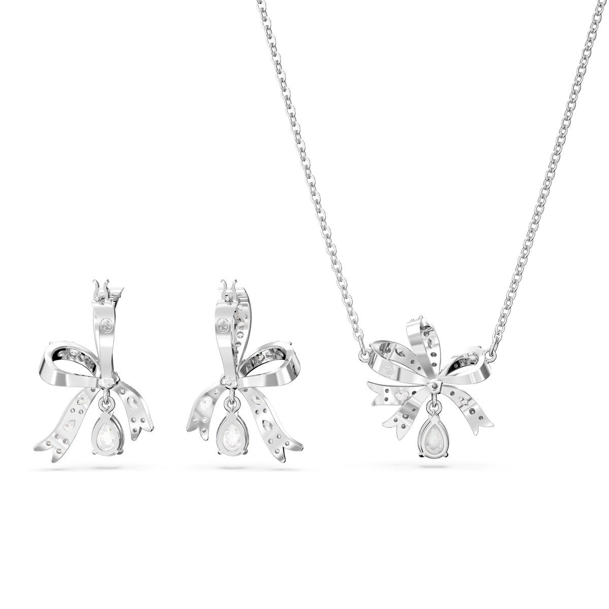 Swarovski Volta bow earring and necklace set with white and rhodium plating, featuring sparkling crystal accents and elegant design.