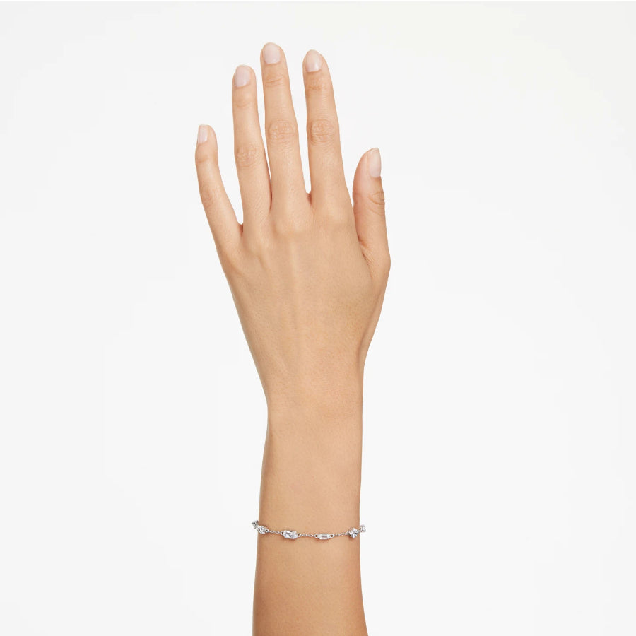 Swarovski Mesmera bracelet with mixed cut crystals in a scattered design, white rhodium plated, elegant jewelry accessory.