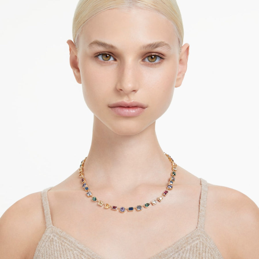 Multicolored Swarovski Stilla All Round Mixed Cuts crystal jewelry with gold-tone plating, showcasing vibrant, faceted gemstone details.