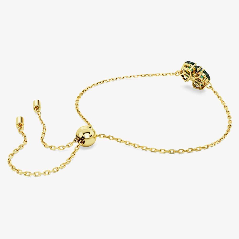 Swarovski Idyllia bracelet with mixed cut green clover-shaped crystals and gold-tone plated links.