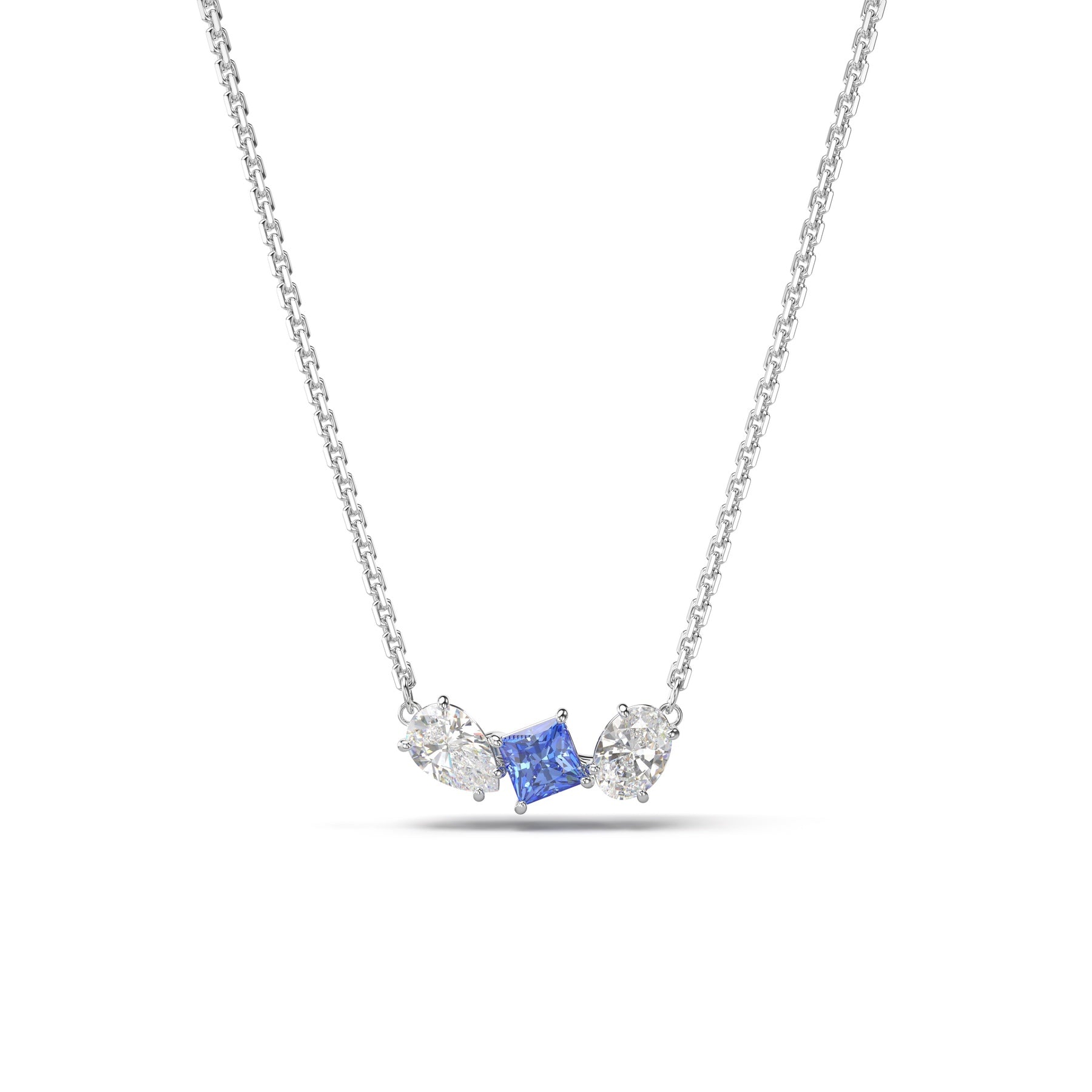 Swarovski Mesmera pendant with mixed blue crystal cuts, rhodium-plated chain and pendant, elegant jewelry accessory.