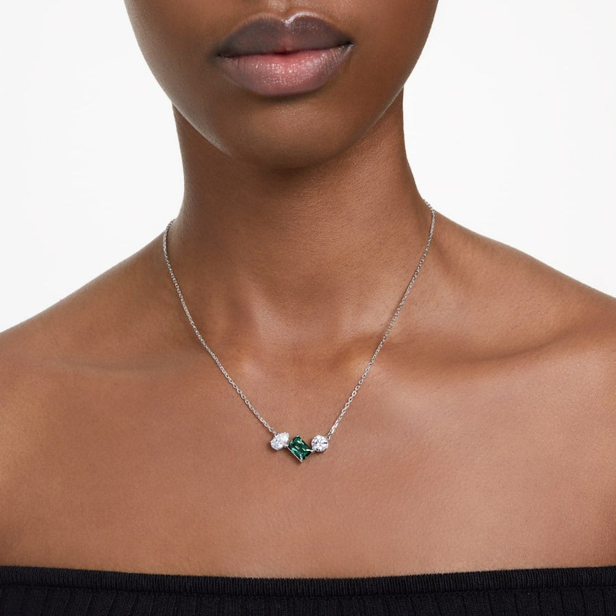 Swarovski Mesmera pendant with mixed cut crystals in a sleek silver setting, showcasing elegant and sparkling jewelry design.