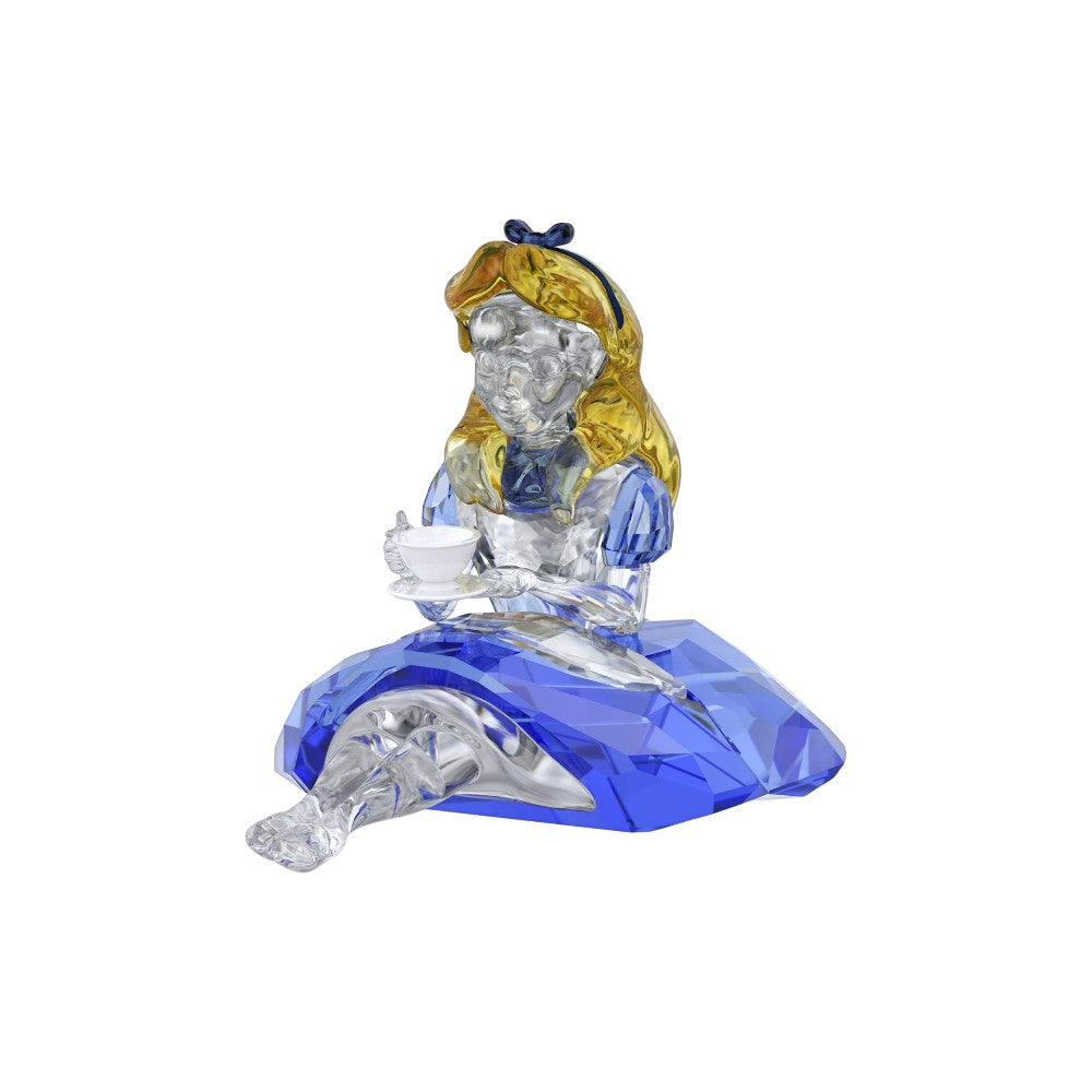 Swarovski Alice in Wonderland collectible figurine featuring Alice in a blue dress and detailed craftsmanship.