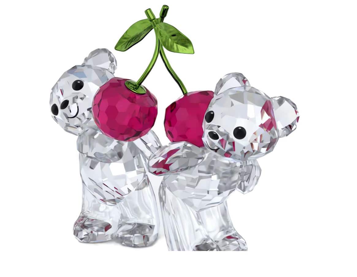 Swarovski Kris Bear Always Together figurine featuring two crystal bears with heart-shaped accents and intricate detailing.