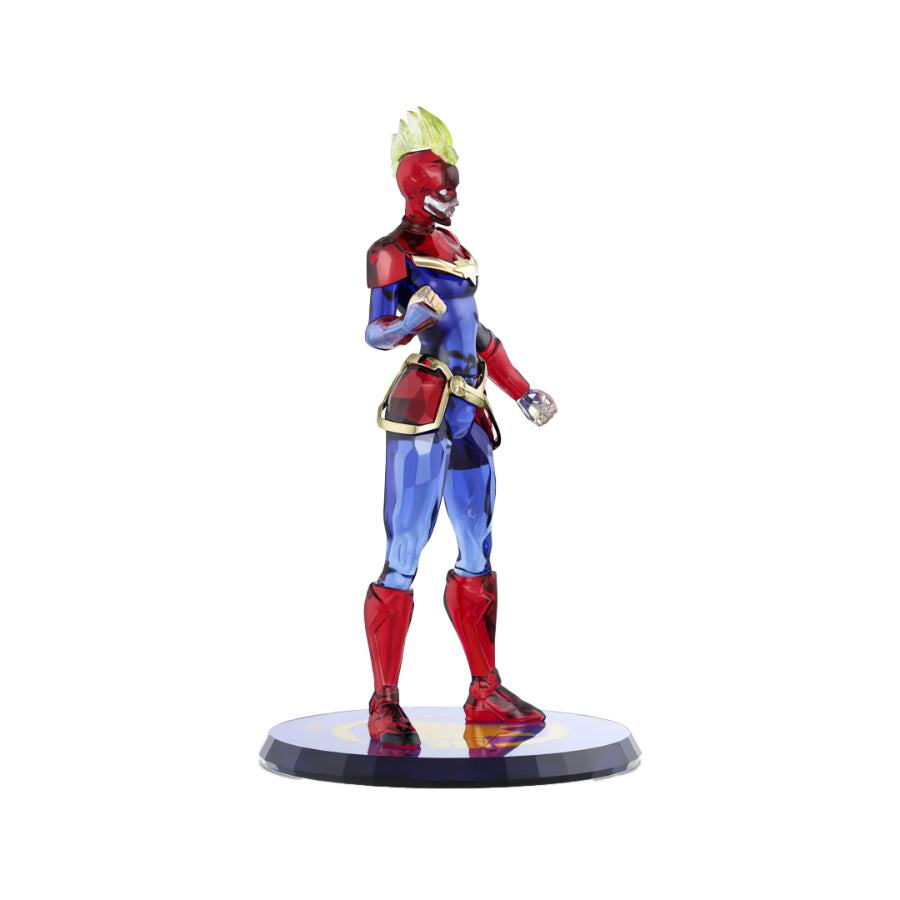 Swarovski Marvel Captain Marvel crystal figurine with detailed red, blue, and gold accents, showcasing the superhero's pose and style.