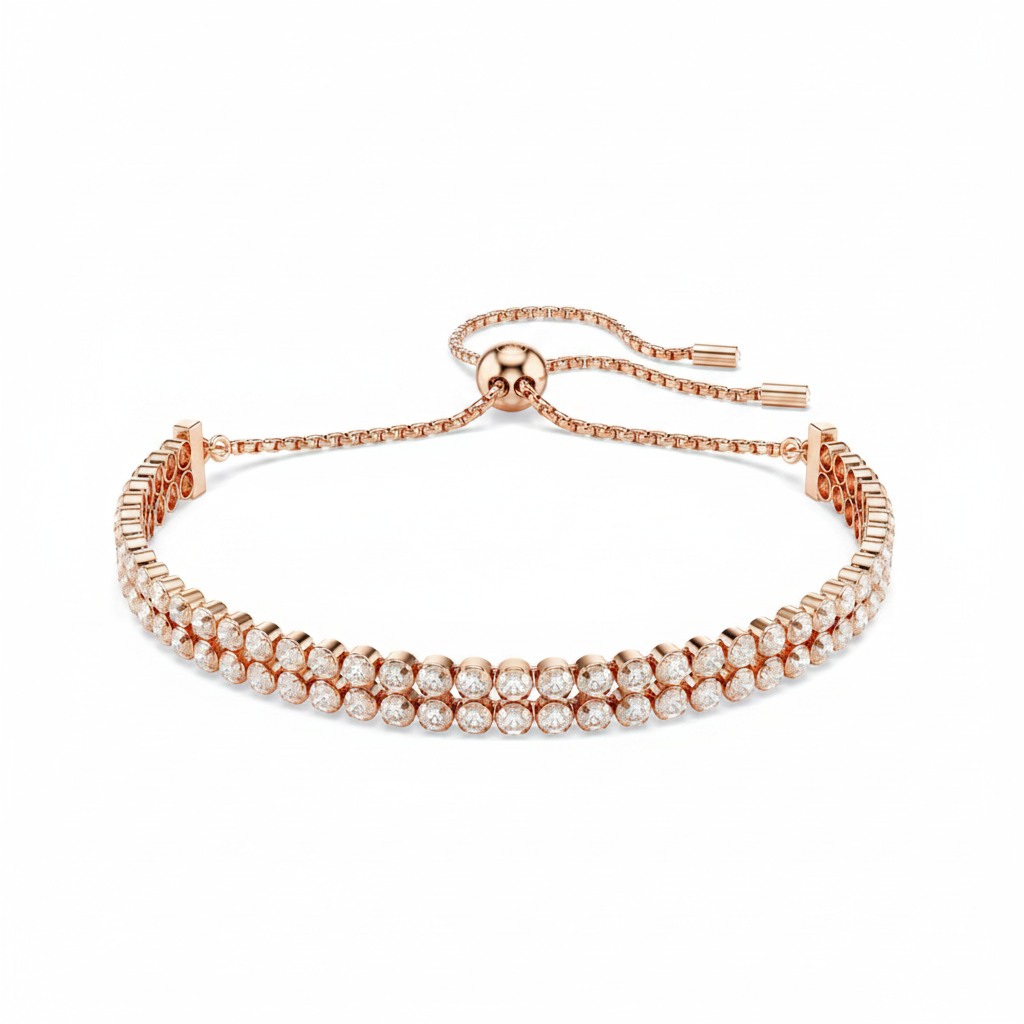 Swarovski Matrix tennis bracelet with sparkling crystal stones and silver-tone metal links on a white background.