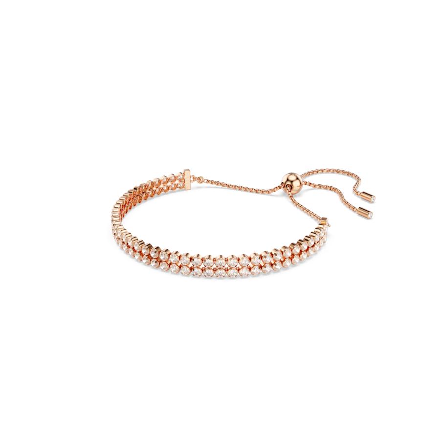 Swarovski Matrix Tennis Bracelet featuring sparkling crystal stones arranged in a sleek, elegant design on a silver-tone chain.