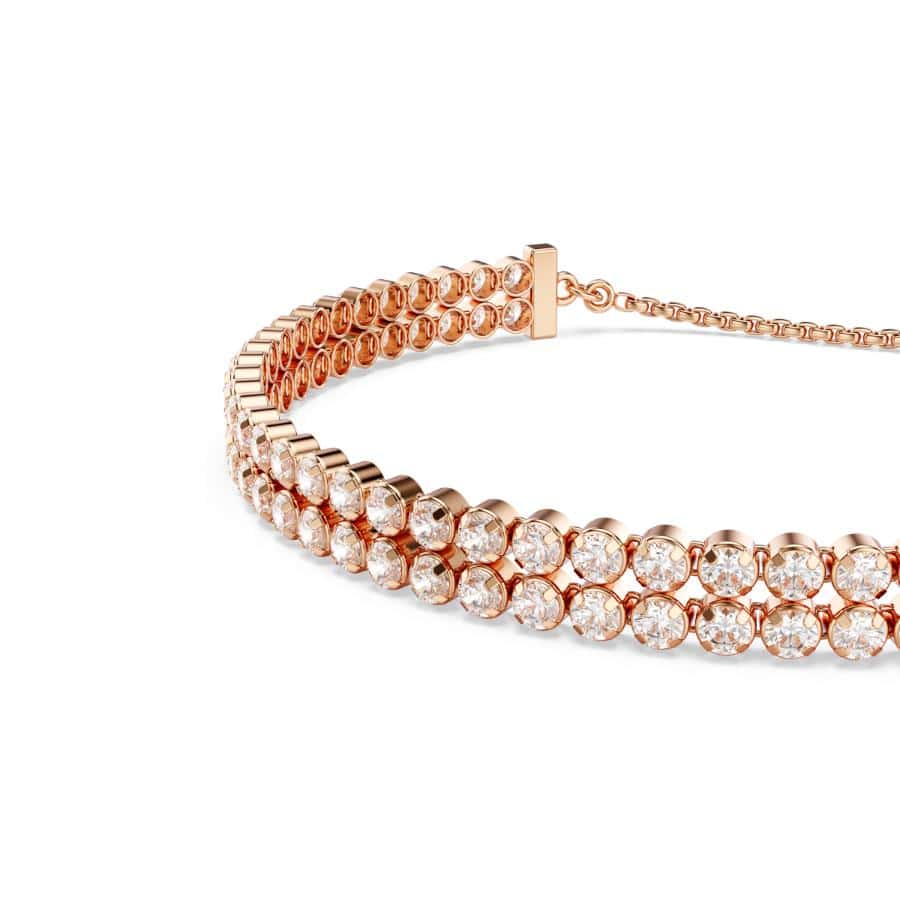 Swarovski Matrix Tennis Bracelet featuring sparkling crystal stones set in a sleek silver-tone design.