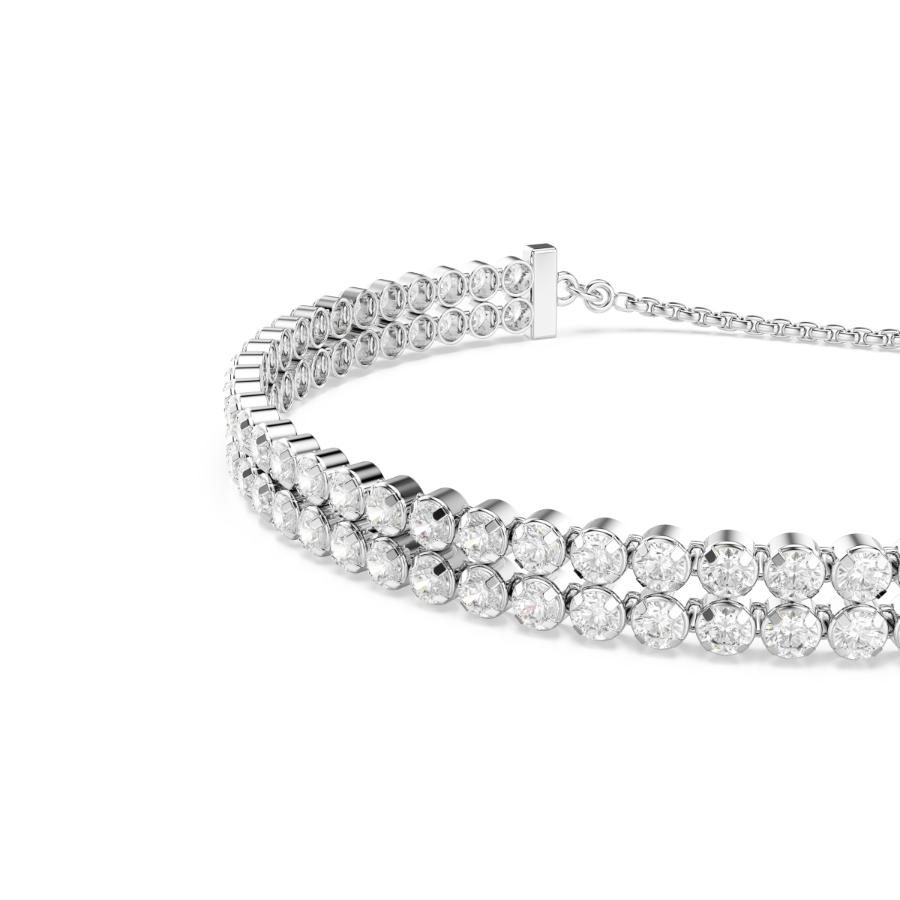 Swarovski Matrix Tennis Bracelet with sparkling cubic crystals set in a silver-tone metal band.