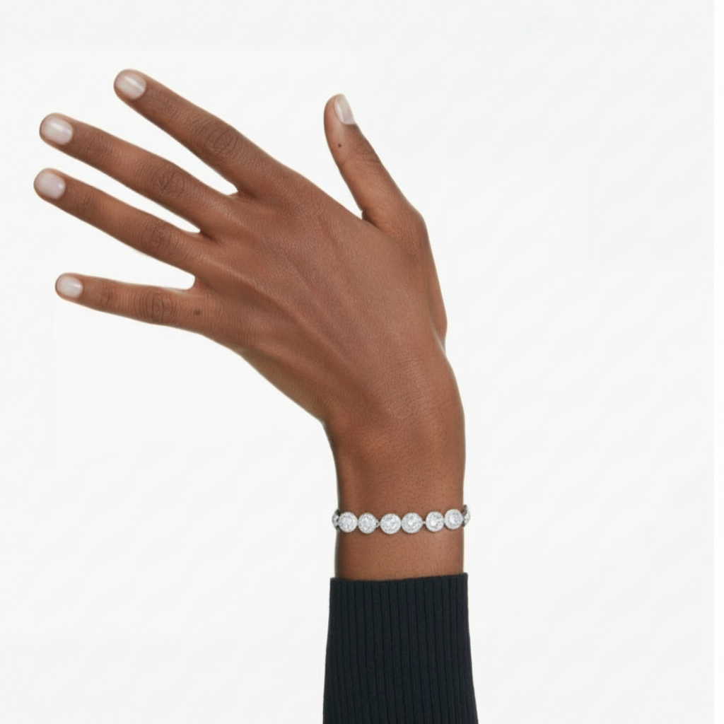 Close-up of Swarovski Una bracelet featuring sparkling crystals and a delicate silver chain, showcasing elegant jewelry design.