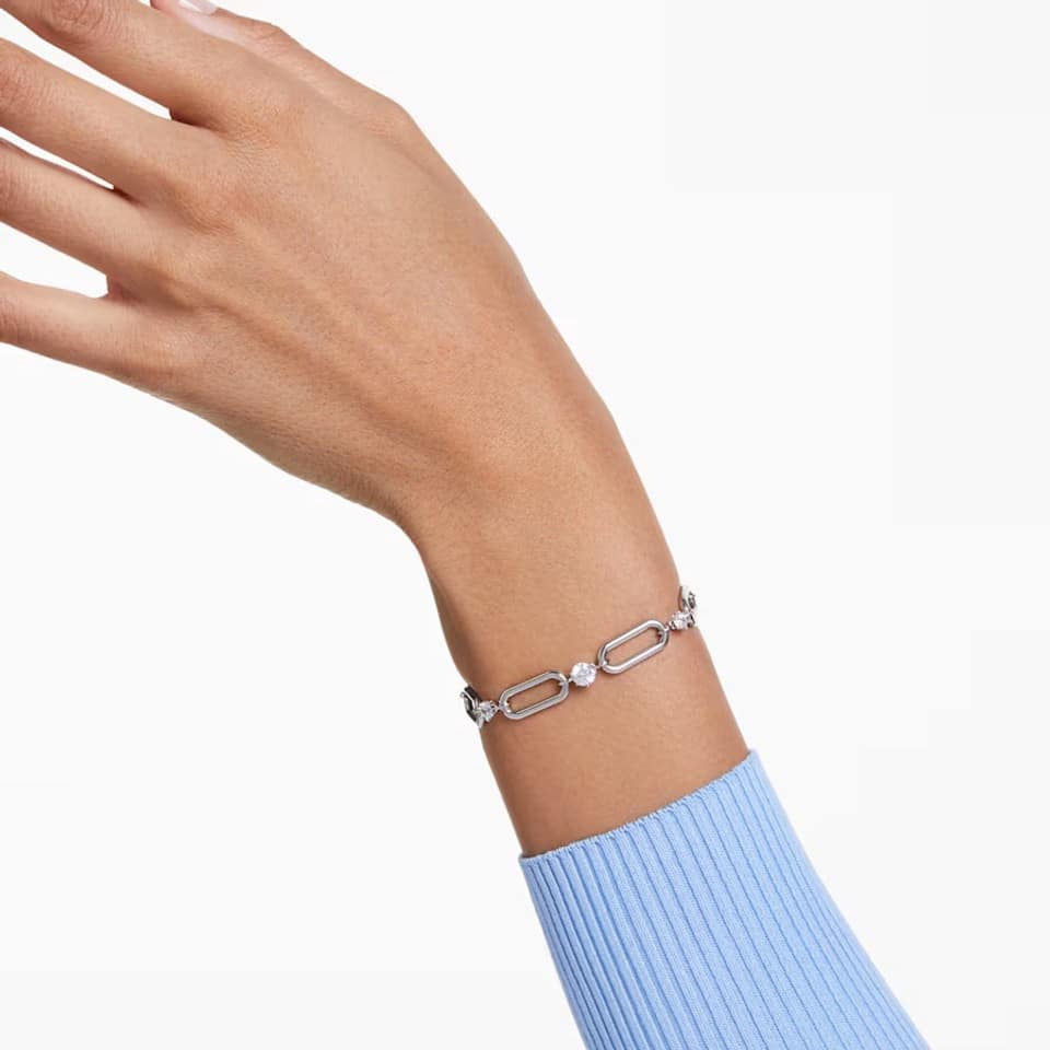 Swarovski Constella bracelet in white with rhodium plating, featuring sparkling crystal accents on a sleek jewelry design.