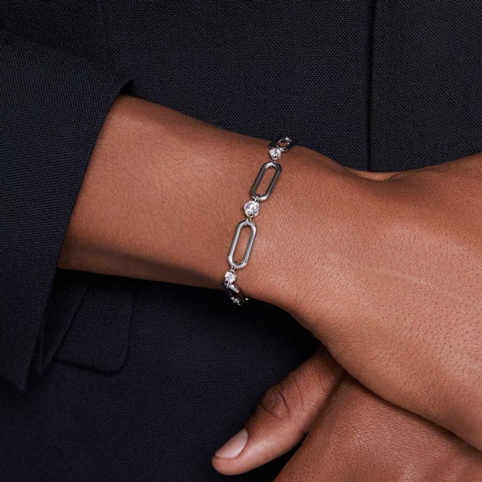 Swarovski Constella bracelet with white crystals and rhodium plating, showcasing elegant jewelry design.