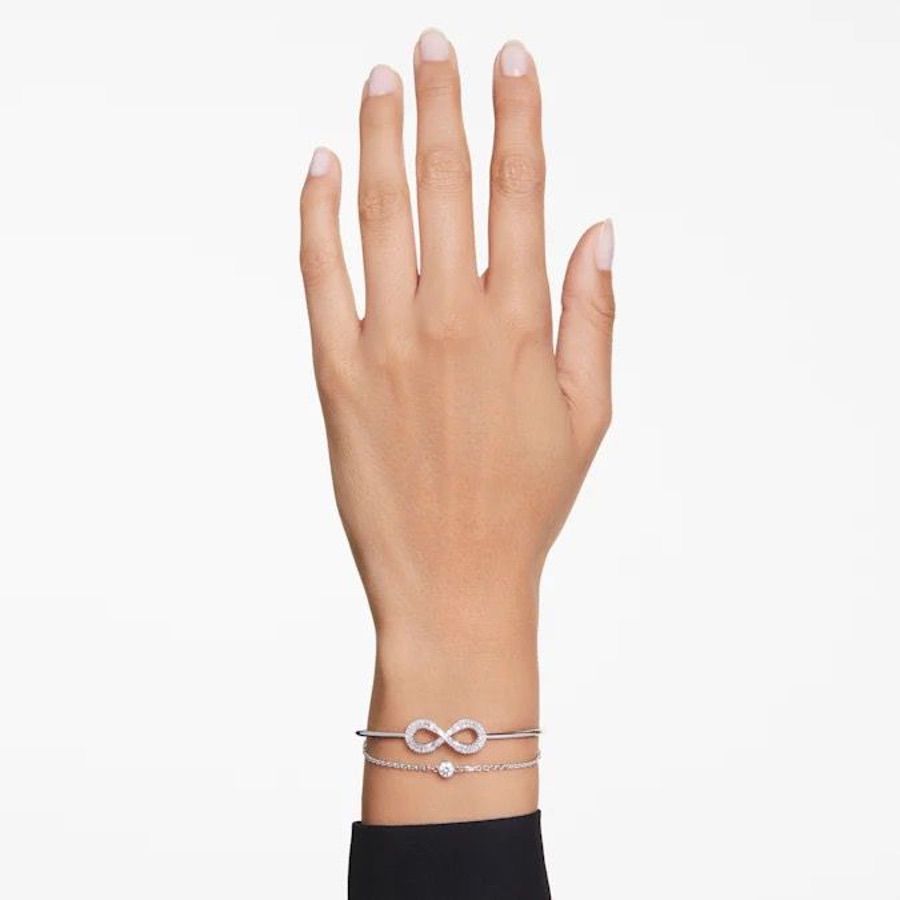 Swarovski Hyperbola Bangle Infinity White Rhodium plated jewelry with sleek, modern design and sparkling crystal accents.