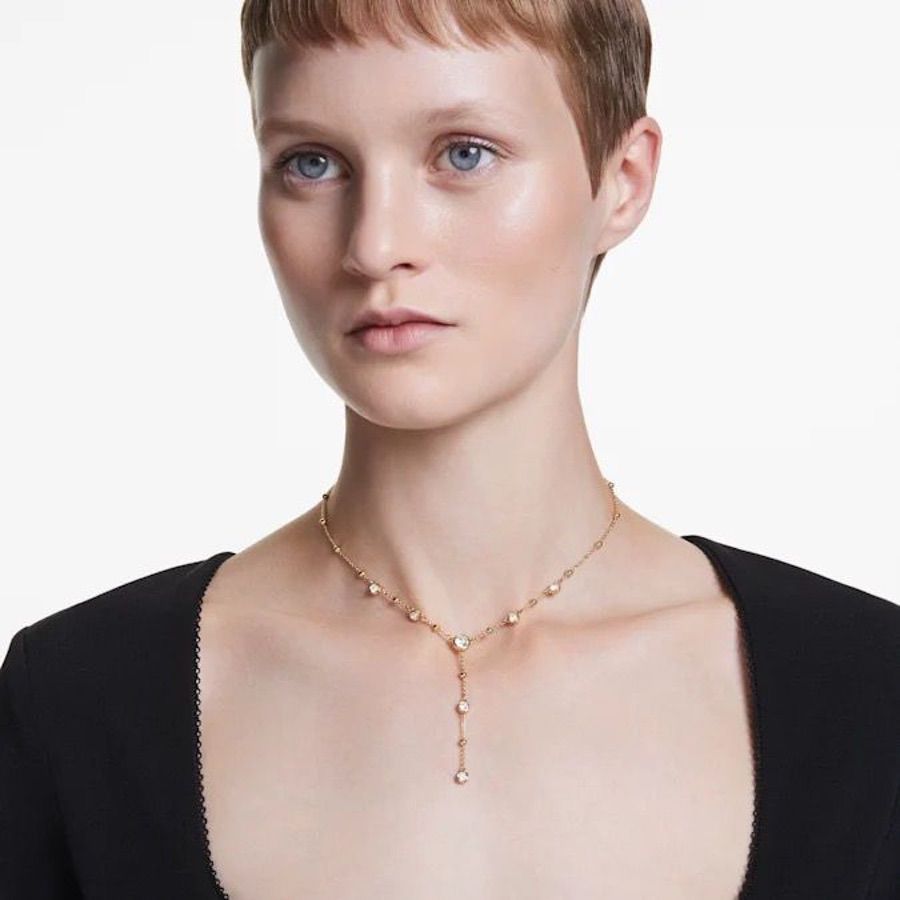 Swarovski Imber Y Necklace with round cut crystals and scattered design in white gold-tone plated metal.