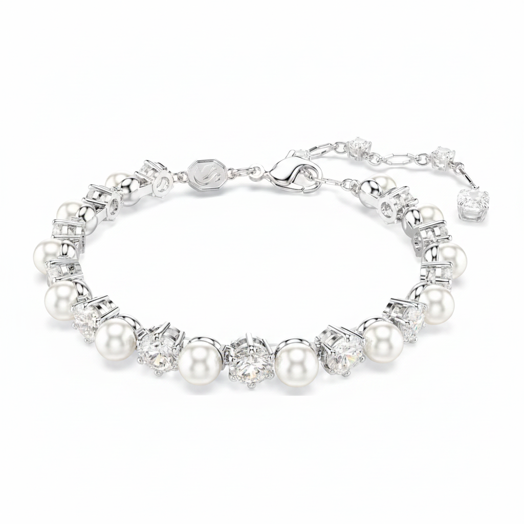 Swarovski Matrix Tennis Bracelet with sparkling crystal stones arranged in a sleek, elegant design on a jewelry display