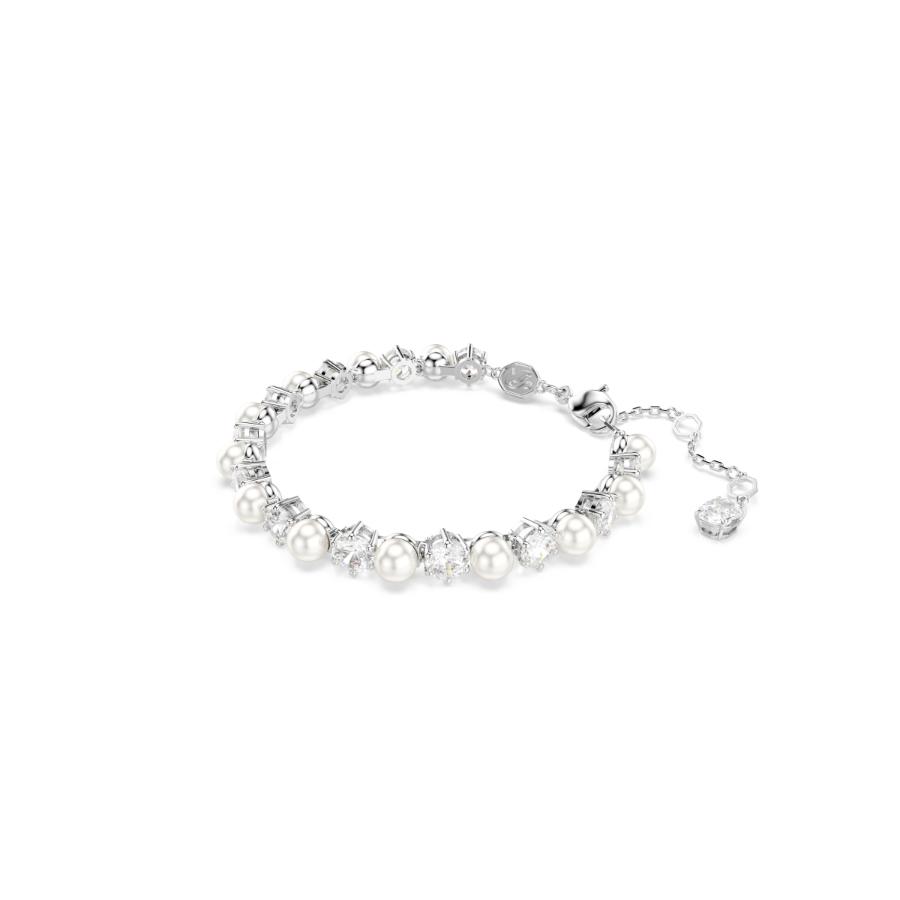 Swarovski Matrix Tennis Bracelet with sparkling crystal stones and silver-tone chain on a white background.