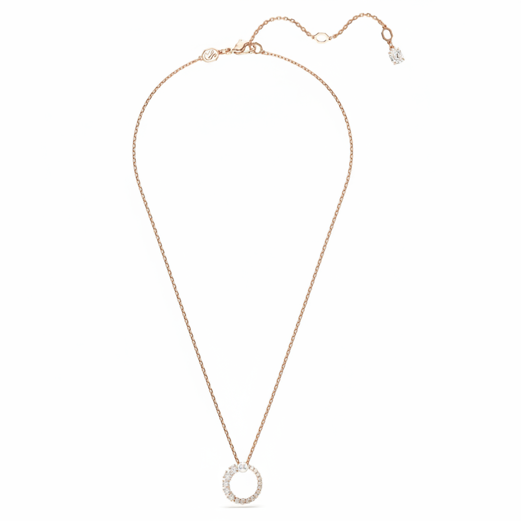 Swarovski Matrix Pendant with white crystal pearl and round cut, rose gold-tone plated jewelry accessory.