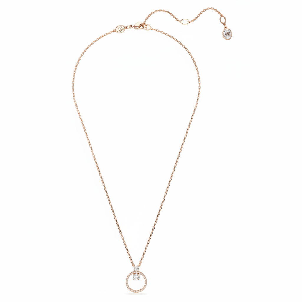 Swarovski Constella pendant with pavé round cut white crystals in rose gold-tone plated setting, elegant jewelry piece.