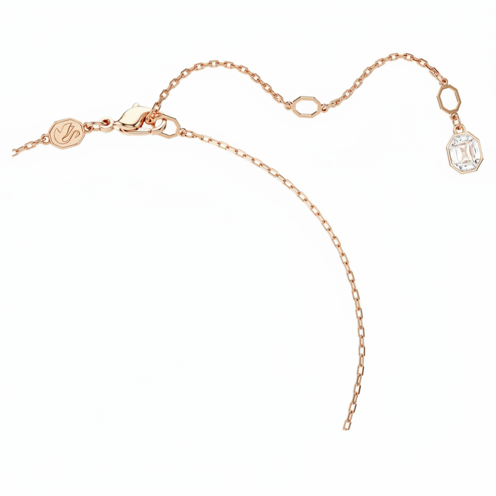 Swarovski Constella pendant with pavé round-cut white crystals in rose gold-tone plated setting, showcasing elegant jewelry design
