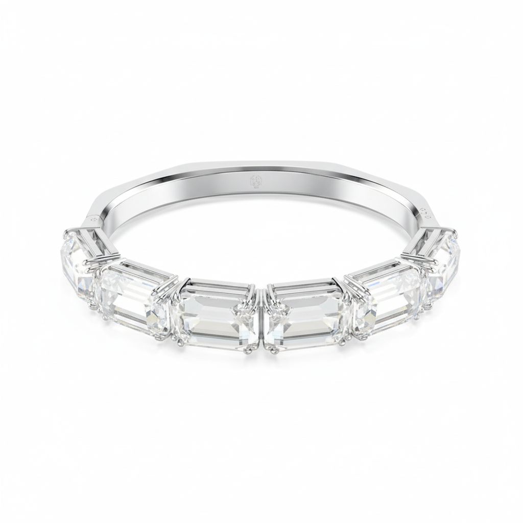 Swarovski Millenia bangle with octagon cut white crystals, rhodium-plated and sleekly designed for elegant wear.
