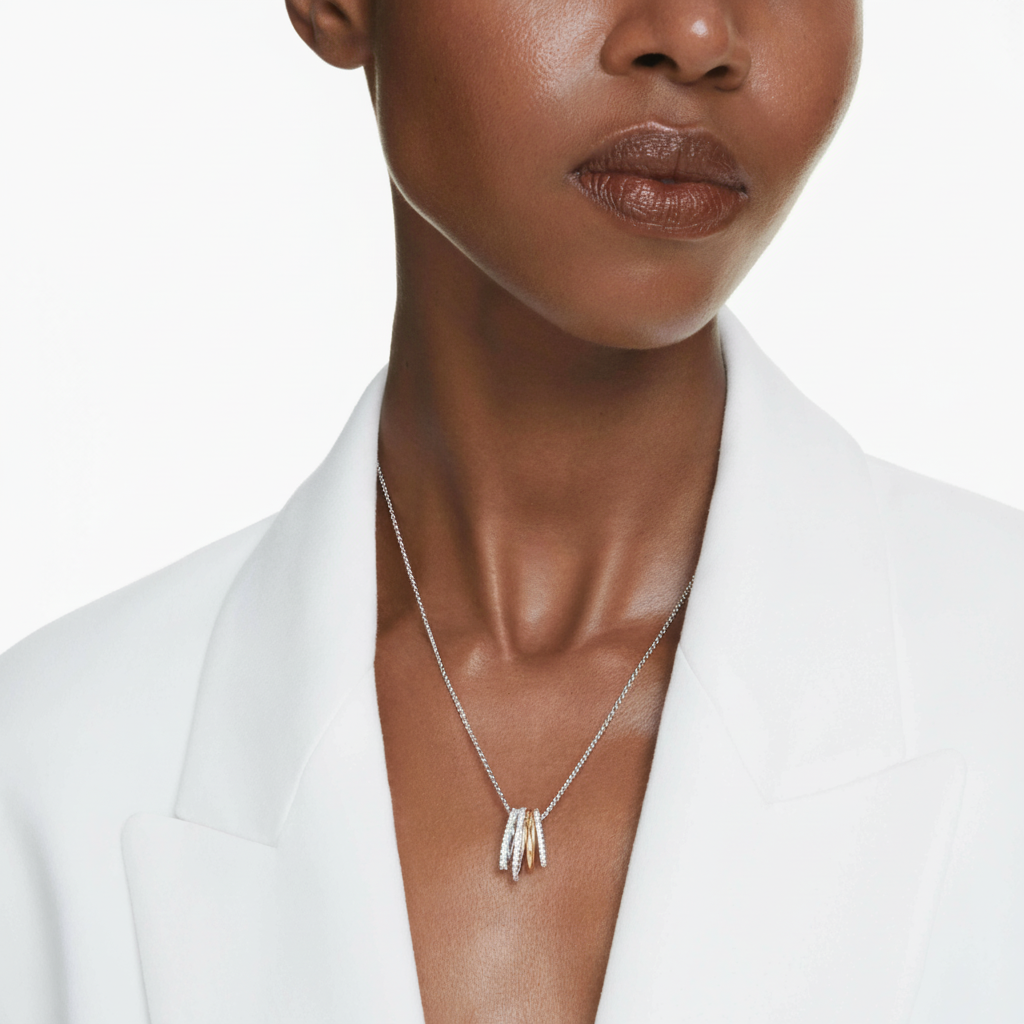 Swarovski Hyperbola pendant with mixed cuts in white crystal and mixed metal finish, showcasing elegant jewelry design.
