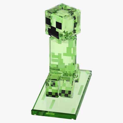 Swarovski Minecraft Creeper figurine with sparkling crystal details, showcasing a green pixelated creeper character from the game.