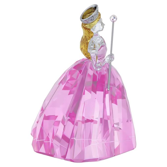Swarovski Wicked Glinda Upland figurine featuring detailed crystal craftsmanship and vibrant colors, showcasing a whimsical fairy design.
