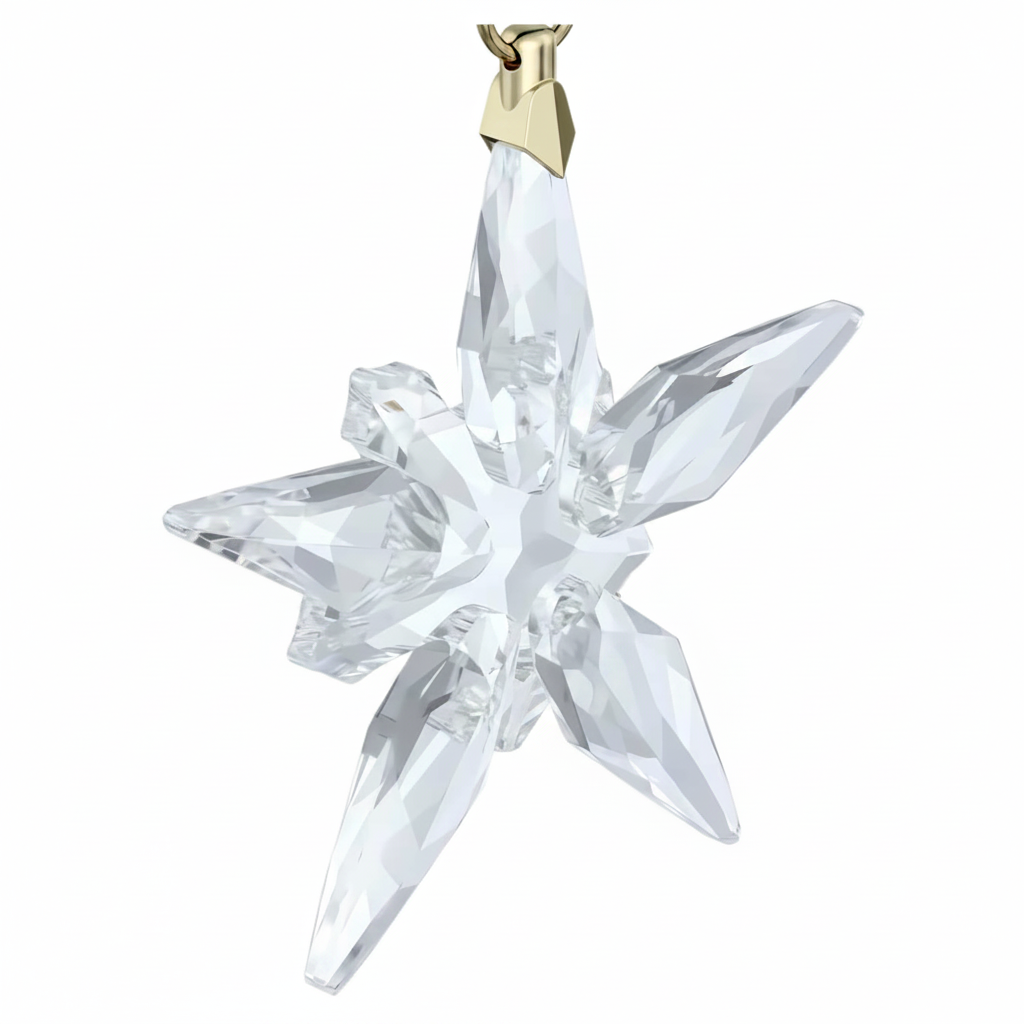 Swarovski Annual Edition Little Star Ornament 2025, clear crystal star with intricate detailing, hanging on a silver string.