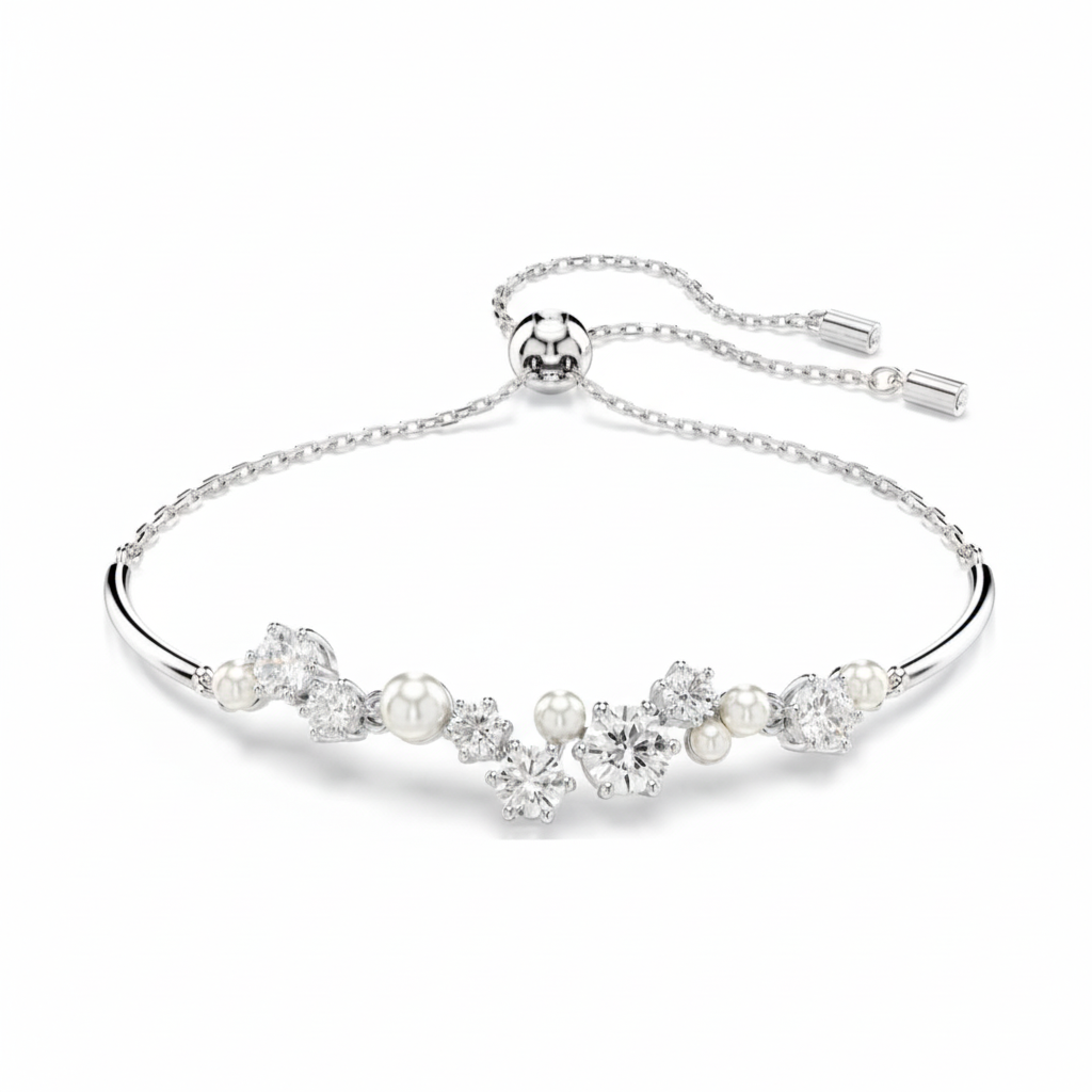 Swarovski Constella bangle with crystal pearls and round cut white stones, rhodium plated jewelry accessory