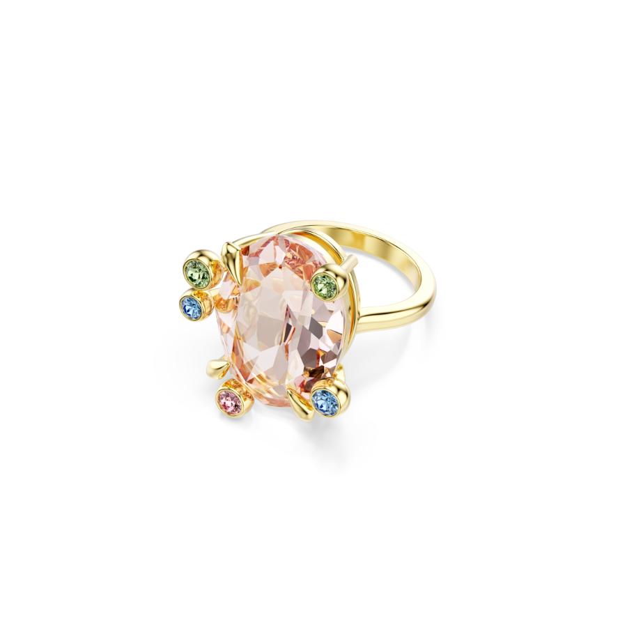 Set of three Swarovski Gema rings with multicolored Swarovski crystals, gold-tone plated, featuring mixed cuts on a jewelry display.